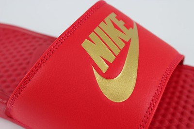 red nike slides gold swoosh